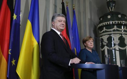 Đức và Ukraine nhất trí tìm cách cải thiện tình hình ở miền Đông Ukraine - 0