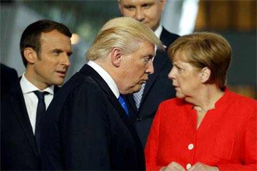 Một ngày của Thủ tướng Đức Angela Merkel: gặp cả Trump và Obama  - 1